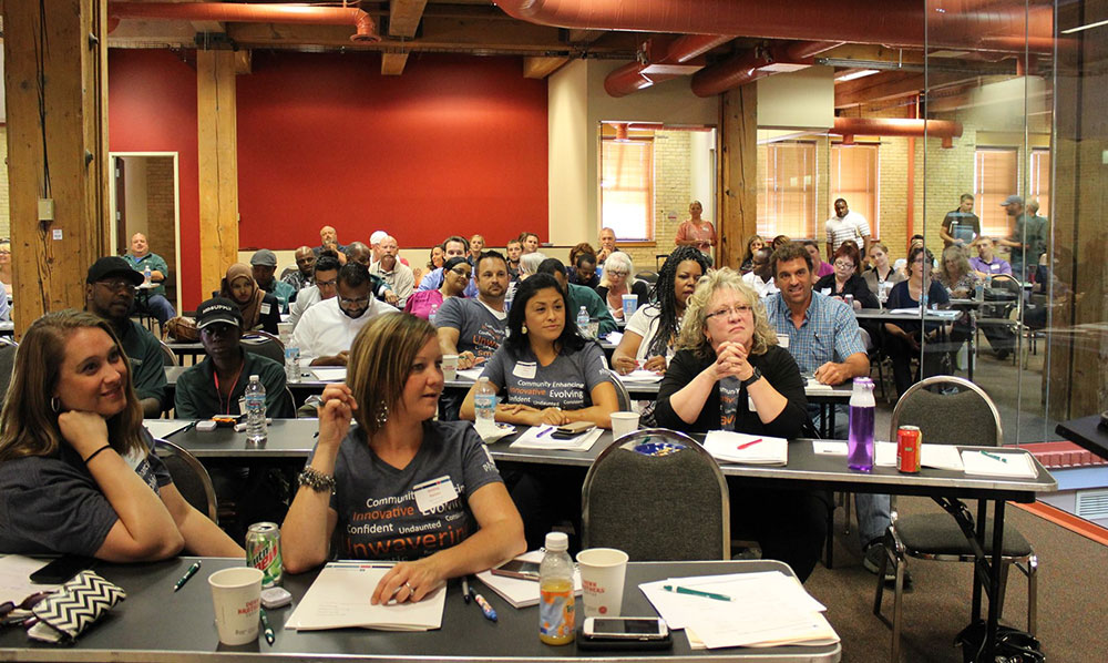 Team members attending meeting