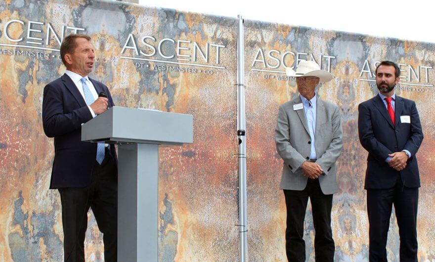 Man speaking on podium